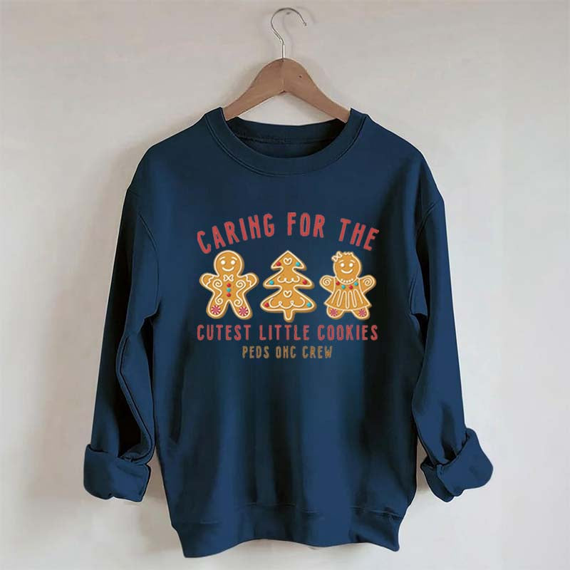 Caring For The Cutest Little Cookies Sweatshirt