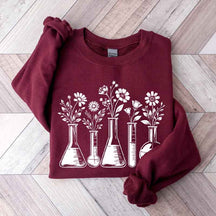 Sleek Botanical Beaker Sweatshirt