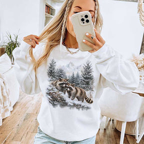 Retro Raccoons Snowy Forest Winter Scene Sweatshirt