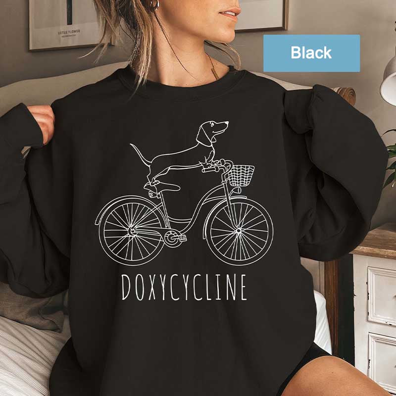 Doxycycline Dachshund on Bicycle Sweatshirt