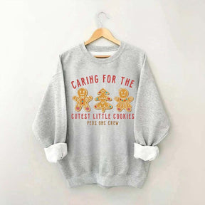 Caring For The Cutest Little Cookies Sweatshirt