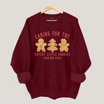 Caring For The Cutest Little Cookies Sweatshirt