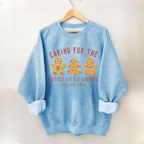 Caring For The Cutest Little Cookies Sweatshirt